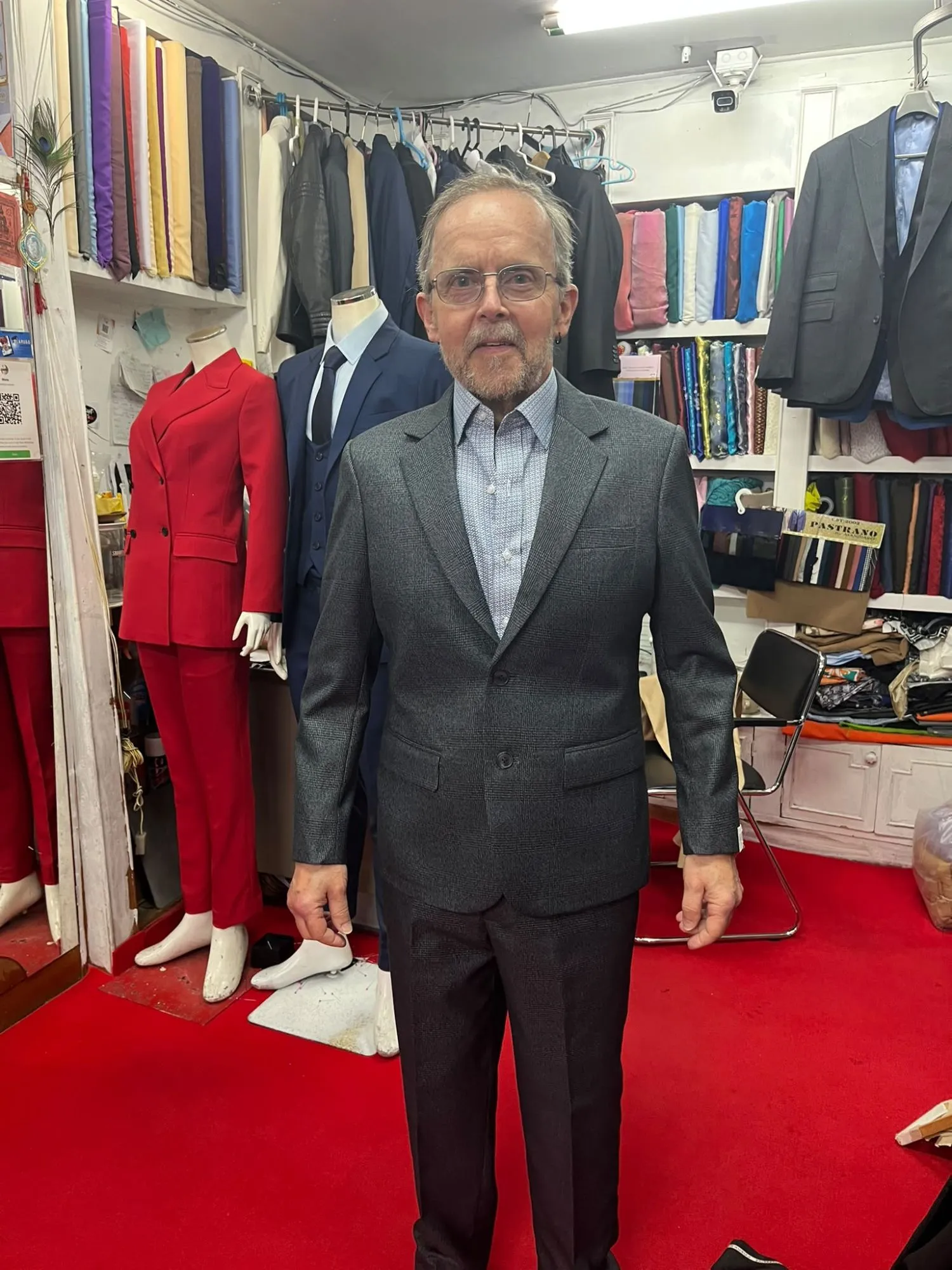 Customer fitting a custom garment at Oslo Tailor, Patong